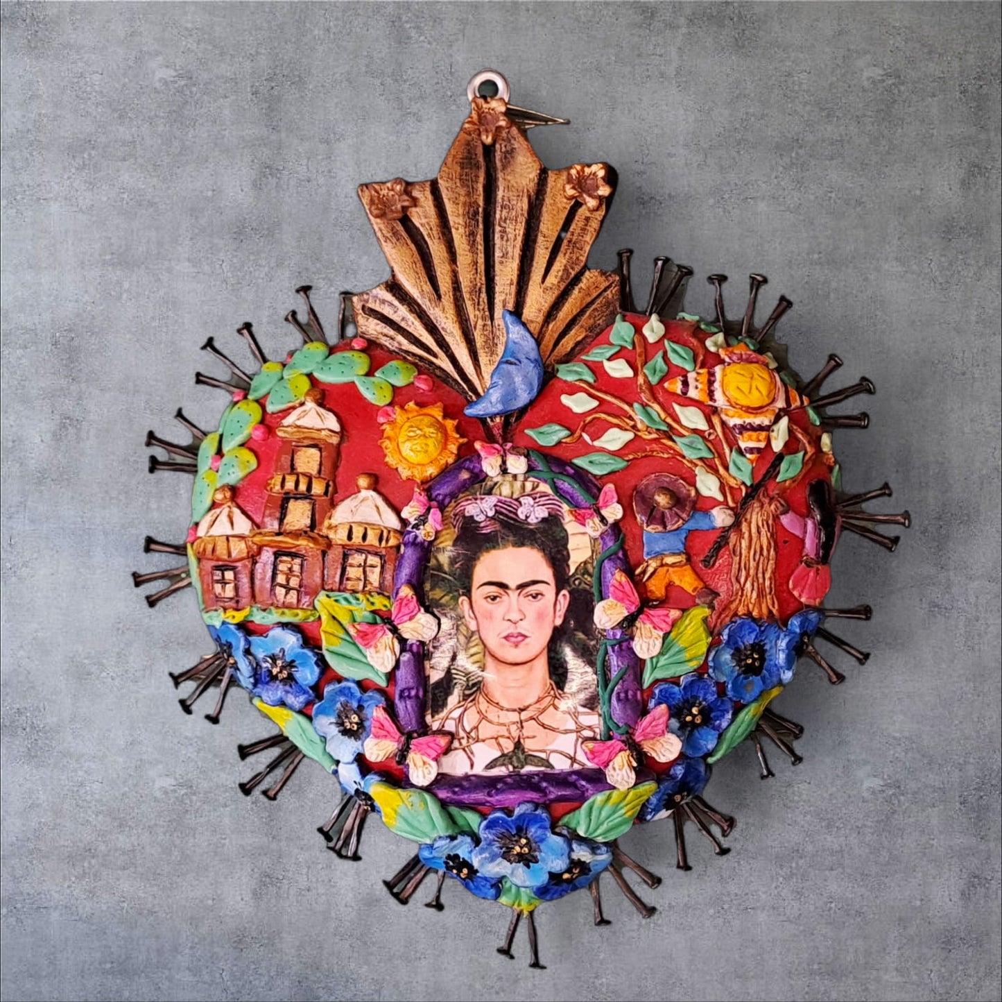 Milagrito Frida clavos